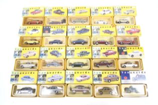 A collection of Lledo Vanguard diecast cars.
