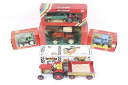 A Collection of 1:32 scale diecast tractors.