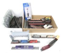 A OO Gauge collection of coaches and wagons etc.