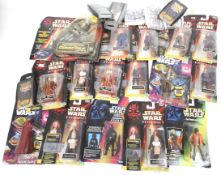 A collection of Star Wars 1990s action figures.
