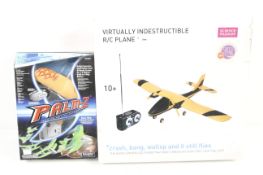 A collection of two remote controlled planes.