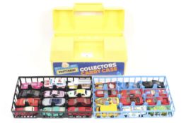 A Matchbox collectors carry case containing 24 Matchbox cars.