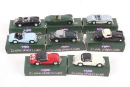 A collection of eight corgi classic sports cars.