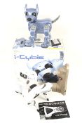 An I Cybie robot remote controlled dog. Complete with stand and remote, unboxed.
