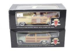 Two 'Motor City Classics' 1:18th scale diecast cars.