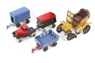 Two tin plate vehicles. Comprising one car and one truck complete with three trailers.