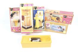 A collection of Sindy bathroom furniture.