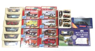 A mixed collection of boxed diecast cars.