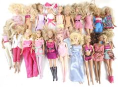 A mixed collection of Barbie dolls with accessories.
