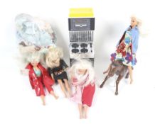 A collection of Sindy dolls and accessories.
