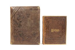 Two leather bound photograph albums. Albumen and silver gelatin prints, mostly portraiture.