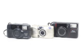 Three 35mm compact point and shoot cameras.