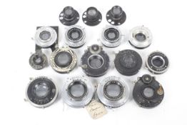 An assortment of vintage camera lenses. To include examples from Kodak, Kershaw, Dallmeyer and more.