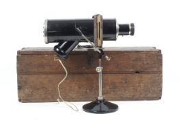 An unbranded magic lantern projector. With lens and slide holders.