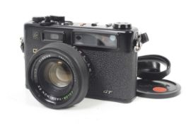 A Yashica Electro 35 GT 35mm rangefinder camera. Black. Serial No. 10153589. With a Yashica 45mm f1.