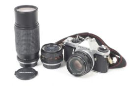An Asahi Pentax ME Super 35mm SLR camera outfit. With three lenses; an SMC Pentax-M 50mm f1.