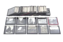 A collection of photographic magic lantern slides.