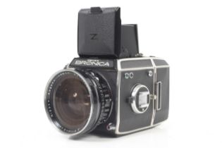 A Zenza Bronica EC 6x6 medium format SLR camera. Silver, Serial No. CB 323443.