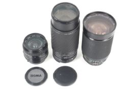 Three Nikon F mount lenses. To include a Sigma 24mm f2.8 Super Wide II, a Vivitar 28-200mm f3.5-5.