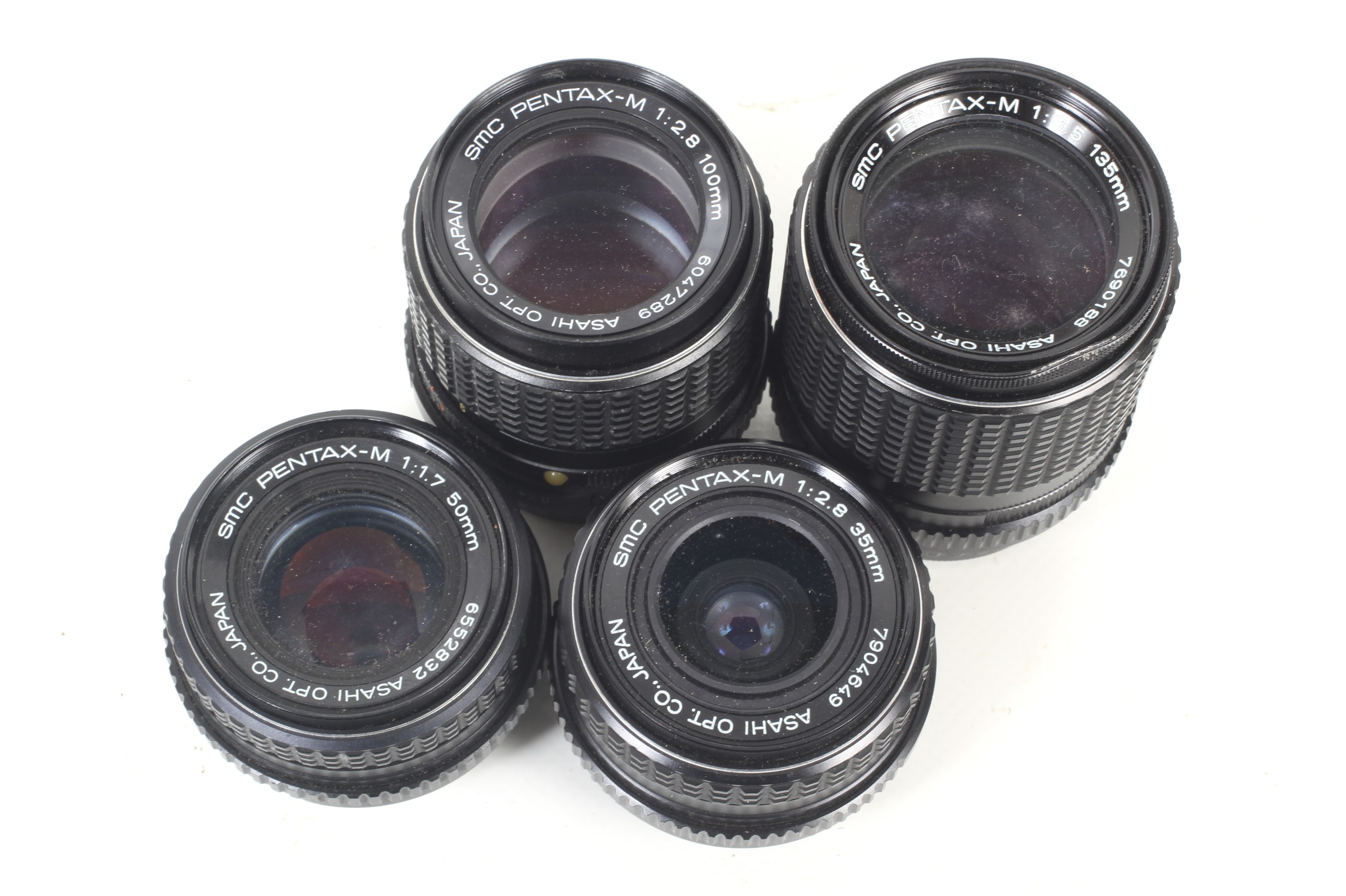 An Asahi Pentax MX 35mm SLR camera outfit. To include four SMC Pentax-M lenses; 35mm f2.8, 50mm f1. - Image 4 of 4