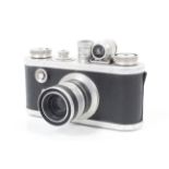 A Corfield Periflex 35mm camera. Chrome. With a Corfield 50mm f3.