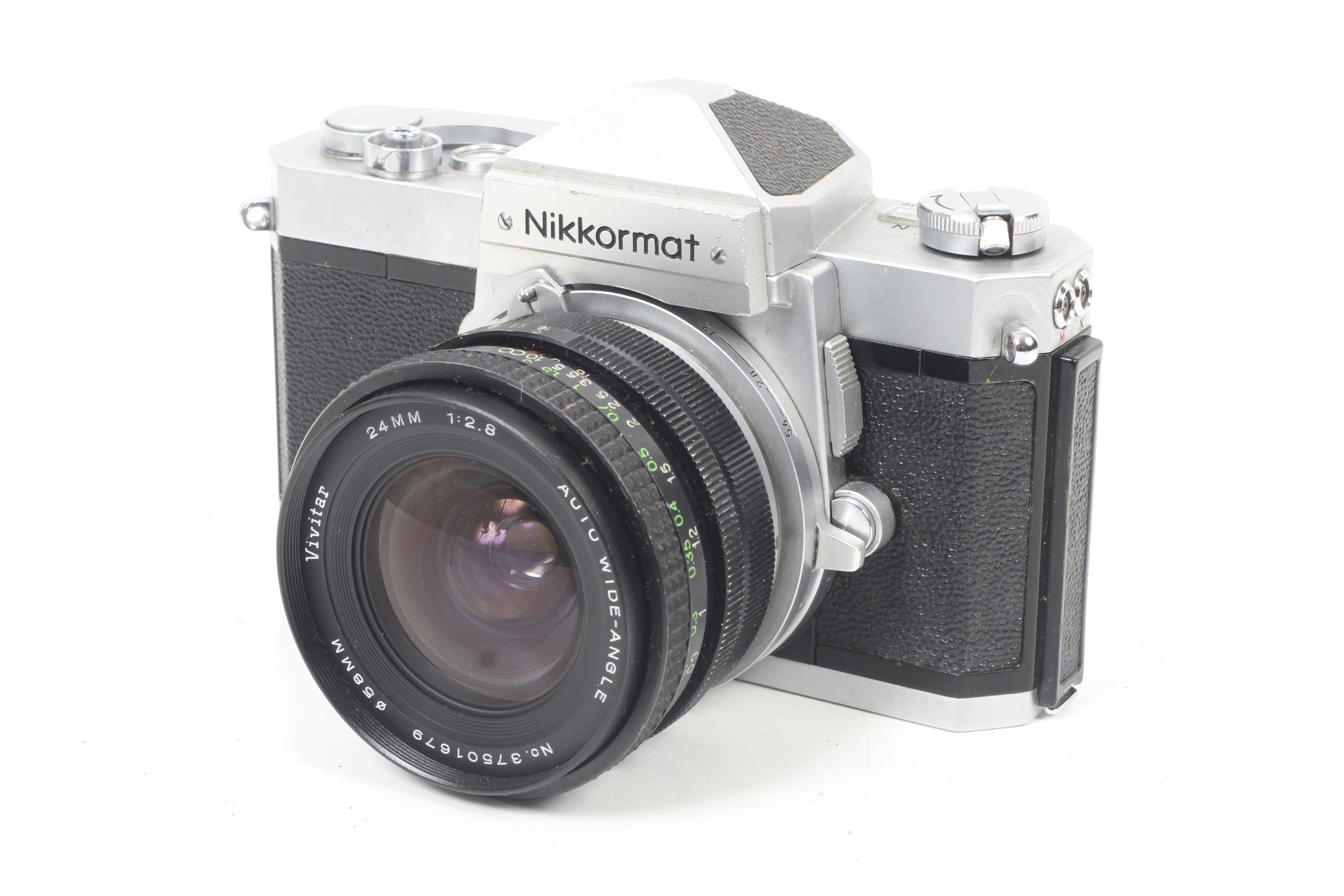 A Nikon Nikkormat FT-N 35mm SLR camera. Chrome. Serial No. FT 4189810. With a Vivitar 24mm f2.