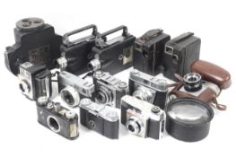An assortment of film cameras and cine cameras.