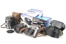 An collection of film cameras. To include a Pentax MZ-30 with a Sigma 28-200mm f3.5-5.