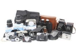 An assortment of film and digital cameras and optical equipment.