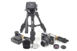 An Olympus Pen E-PL1 Mirrorless Digital camera. With an Olympus 14-42mm f3.5-5.6 M.