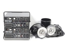 A pair of Bowens Quadmatic 2000-H studio flash heads and power packs.