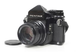 A late Pentax 67 6x7 medium format SLR camera. With an SMC Pentax 105mm f2.