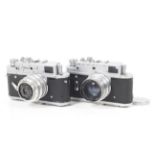 Two Zorki 4 35mm rangefinder cameras.
