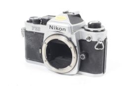 A Nikon FE2 35mm SLR camera body. Chrome. Serial No. 2431037.