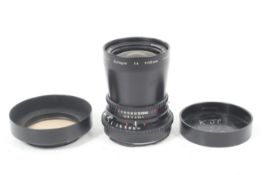 A Carl Zeiss 50mm f4 Distagon lens. Black. Serial no. 6276175. Hasselblad mount.
