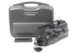 A Panasonic M10 Stereo AV Zoom VHS video camera. Within plastic fitted case.