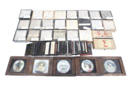 A large collection of glass magic lantern and photographic slides.