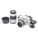 A Minolta Dynax 40 35mm SLR camera outfit. With two lenses; a Minolta 28-100mm f3.5-5.