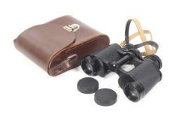 A pair of Carl Zeiss Jena Jenoptem 8x30 binoculars. Serial No. 4711776.