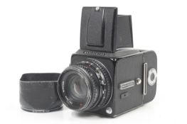 A Hasselblad 500CM 6x6 medium format SLR camera. Black. 1982. Serial No. RH 1266362.