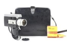 A Canon Auto Zoom 518 Super 8 cine camera. With a 9.5-47.5mm f1.8 Canon Zoom lens and fitted case.