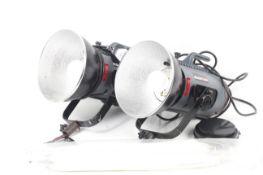 A pair of Courtenay Solaflash 150 studio flash heads.