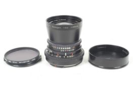 A Carl Zeiss 60mm f3.5 Distagon lens. Black. Serial No. 5734748. Hasselblad mount.