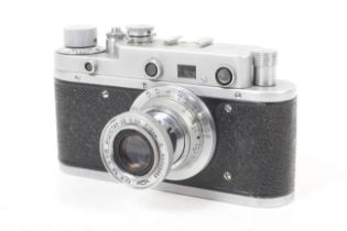 A Zorki C 35mm rangefinder camera. Chrome. Serial No. 56069564. With an Industar 50mm f3.