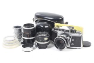 An Exakta VX1000 35mm SLR camera outfit. With three lenses; a Carl Zeiss Jena 50mm f2.