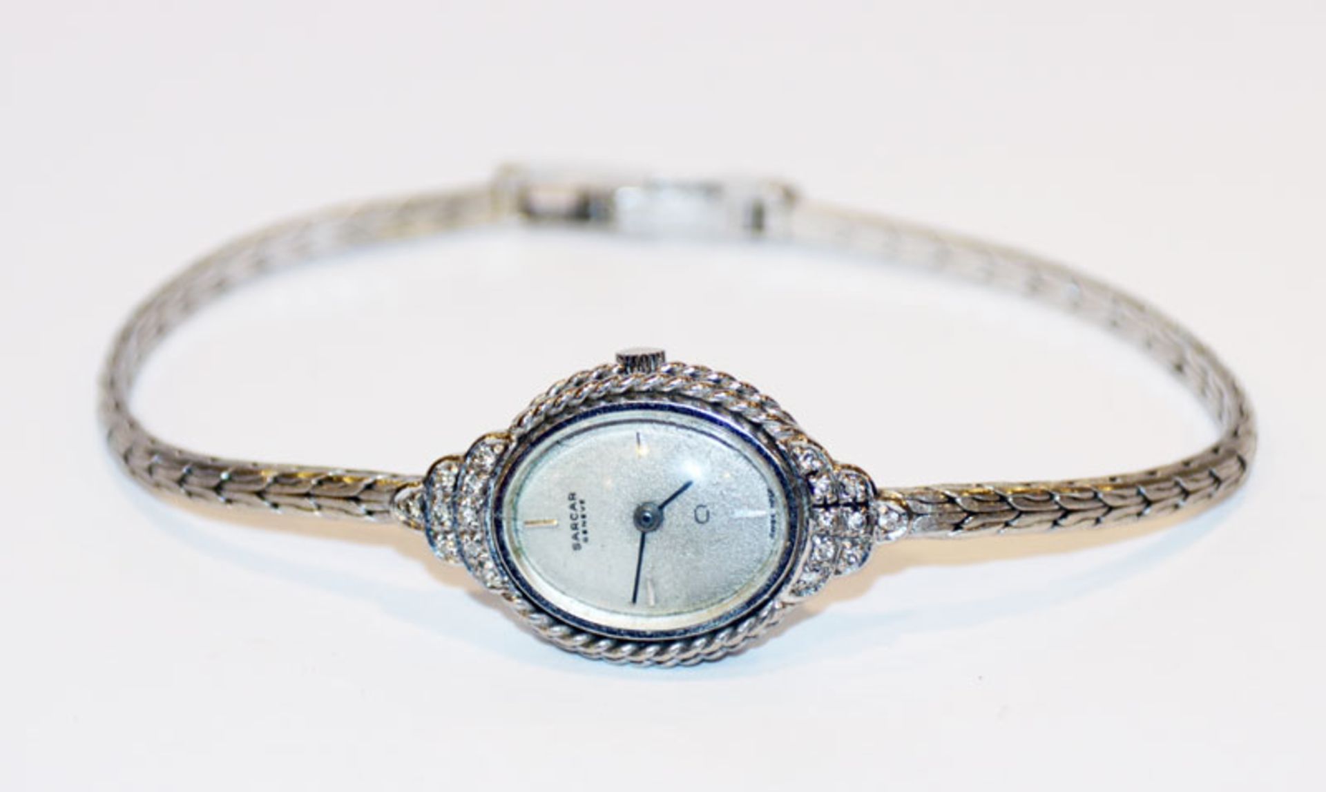 14 k Weißgold Damen-Armbanduhr mit Diamanten, Sarcar Geneve, intakt, 16,8 gr., L 17 cm, Tragespuren
