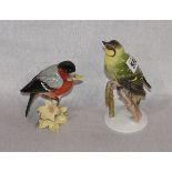 Rosenthal und Hutschenreuther Porzellanvogel, farbig glasiert, H 14,5/11 cm, leicht bestossen und