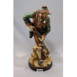 Holz Figurensklulptur 'Jäger mit Hund', farbig gefaßt, H 42 cm