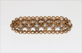 Ausgefallene 14 k Gelbgold geprüfte Brosche in filigraner Handarbeit, mit 18 Diamanten, zus. ca. 1,2