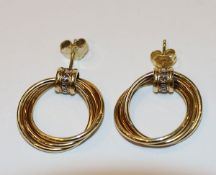 Paar 14 k Gelbgold Ohrstecker mit kleinen Diamanten, 4,7 gr., D 2,2 cm